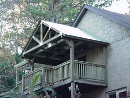This article discusses strategies for building over an existing slab patio or over a deck, and offers links to articles about the specific tasks such as pouring the footings, raising posts, and so forth. Brown Dog Construction