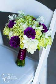 Floral decorations are inspired by a winter wonderland theme for aâ decemberâ wedding in wales… bouquets were made from ice white amaryllis, white anemones, roses, silver brunia. Blog Princess Wedding Purple And Green Wedding Green Wedding Flowers Purple Bridal Bouquet