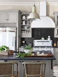 Since stainless steel has been the trend in modern kitchens for the past few years, we're wondering what's next. Offset Gleaming White Appliances By Furnishing A Kitchen With Dark Soapstone Counters And Backsplashes As We Kitchen Inspirations Home Kitchens Kitchen Design