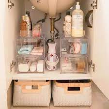 under the sink storage never looked so good the container store bathroom under sink diy bathroom storage tidy bathroom