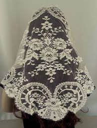 This stole is from a vintage 1922 pattern available online at the antique pattern library, on page 14 of the book (page 17 of the pdf) listed as: 37 Lace Mantilla Ideas Csipke Fatyol Fatylak