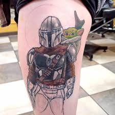 Updated 40 Baby Yoda Tattoos November 2020 Mandalorian Tattoo Star Wars Travel Tattoo Designs
