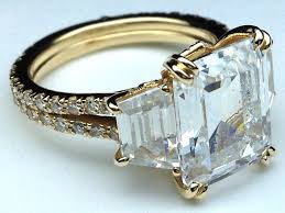 Kwiat emerald cut diamond engagement ring with a wide split diamond band in platinum, from $5900, kwiat.com. Engagement Ring Yellow Gold Three Stone Emerald Cut Diamond Vintage Style Split Band Engagement Ring For Large Diamonds 1 62 Tcw Es605yg