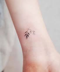 Small flower tattoos is a beautiful tattoo category for girls. Pretty Tiny Flower Tattoo Design On Wrist For Women Tiny Flower Tattoos Tattoo Designs Wrist Flower Tattoo