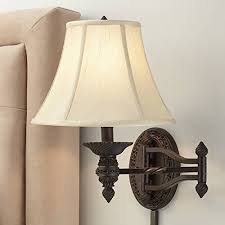 Pair them with swing arm desk lamps and black swing arm wall sconces for an eclectic academia style throughout your own, or keep them confined to your favorite reading nook. Godia Swing Arm Wall Lamp French Country Bronze Plug In Light Fixture Beige Softback Bell Shade For Bedroom Bedside Buy Online In Bahamas At Bahamas Desertcart Com Productid 11610739