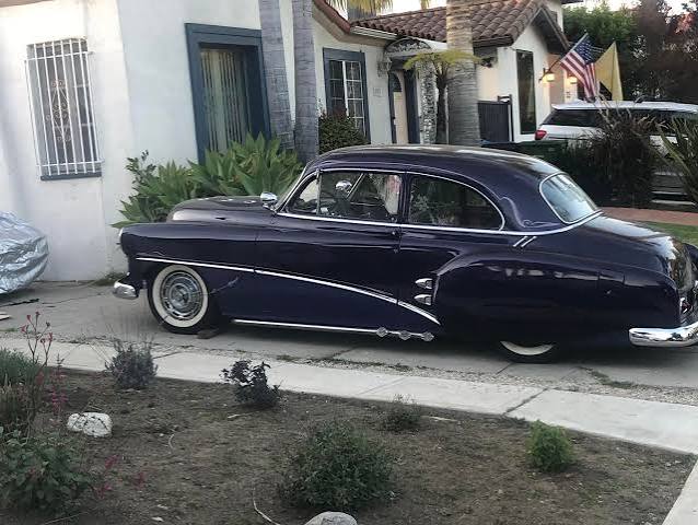 Car with fender skirts at car museum