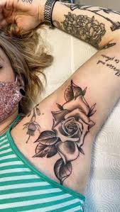 This stunning design has a collection of red roses that look. 14 Awesome Black Rose Tattoos Worth Seeing