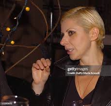 Edison Woods with Julia Frodahl during 2004 Starving Artist Ball at... News  Photo