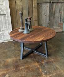This round shape coffee table is made from mango wood and features a smooth wide top that can be used for serving and various decorative purposes. Round Industrial Reclaimed Wood Coffee Table What We Make