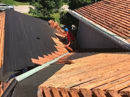 Use a chalk line to align the starter course of cedar shingles. 6 Things That Impact A Cedar Roof Life Expectancy