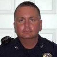 Laurie fires police officer