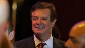 Former Trump aide Manafort sentenced to nearly four years in prison