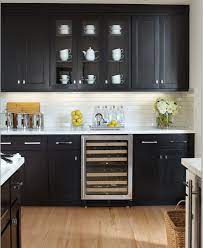 White kitchen cabinets kitchen tiles kitchen colors kitchen countertops new kitchen kitchen dining quartz countertops shaker cabinets kitchen looking to up the drama in your interiors? Remodelaholic Most Popular Black Paint Colors