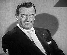 He is famous for his distinctive voice, walk and height. John Wayne Wikipedia