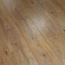 Fusion Greige Oak 12mm V Groove Laminate Flooring Oak Laminate Flooring Flooring Laminate Flooring Colors