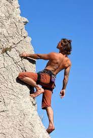 Climb The Wall Climber On The Vertical Wall Sponsored Wall Climb Vertical Climber A Body Reference Poses Poses Reference Photography Action Poses