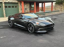 Image result for Carbon Black 2014 Aston Martin