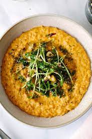 Sunflower Carrot Risotto With Hazelnut Pea Shoots Naturally Recipe Recipes Cooking Vegetarian Recipes