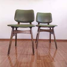 Its superior strength is thanks to it's thick leather dining chairs like these are similar to upholstered chairs, the only exception is the fabric material. Pair Of Midcentury Modern Dining Chairs Scandinavian Design Chairs Green Eco Leather 60s Retro Taste