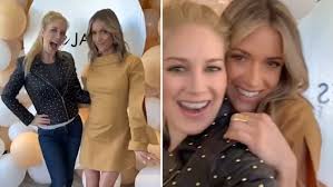 Heidi Montag can't stop smiling as she dotes