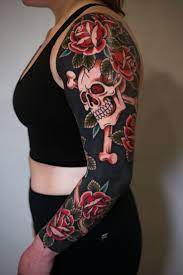 Matching black traditional rose tattoos on both hands by tom flanagan Traditional Sleeve Tattoo