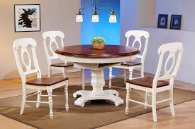 This solid, wooden construction is not only aesthetically pleasing but also very comfortable. Butterfly Leaf Dining Table Antique White Chestnut Finish Top Sunset Trading