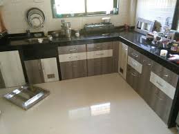 L Shaped Modular Kitchen Swara S Kitchen Interior Kitchen Furniture Design Simple Kitchen Design Kitchen Cupboard Designs