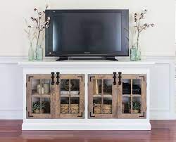Remove the baseboard molding from the wall where the entertainment center will go. 8 Free Entertainment Center Plans