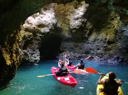 Algarve is known for its breathtaking cliffs, caves, crystal blue water, and golden beaches we just couldn't get enough of this stunning place. Cave Tour In Lagos A Kayaking Adventure Portugal