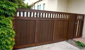 Spanish style wooden gates | iron gates : Why Wait To Buy A Fence Harwell Design Fences Driveway Gates Los Angeles Santa Monica