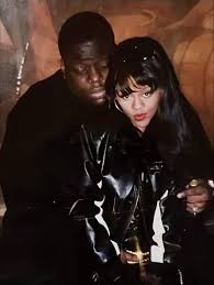 Biggie Smalls & Lil Kim (1994-1997) Biggie and Lil' Kim had a passionate  and complicated relationship that blended love, mentorship, and music.  Biggie discovered Kim's talent early on and helped launch her