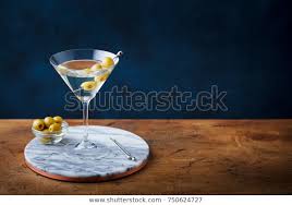 Photo De Stock De Martini Cocktail Green Olives On Marble Modifier Maintenant 750624727 Martini Martini Cocktail Cocktail