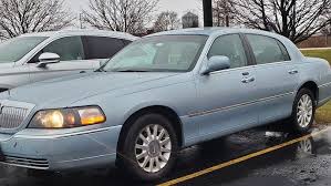 Image result for Light Ice Blue 2005 Town Car