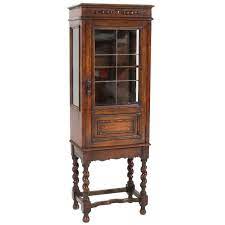Magnificent oak corner china cabinet cupboard hutch sq nail 4dr w crown antique. Oak Small Jacobean Style China Cabinet 1930s For Sale At 1stdibs