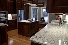 Kitchen Quartz Countertops With Oak Cabinets White Countertops That Go With Cherry C Cherry Cabinets Kitchen Quartz Kitchen Countertops Best Kitchen Cabinets