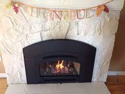 Replace yours with a energy efficient gas insert! Gas Insert Installed In Arched Masonry Fireplace Custom Fireside