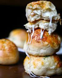 Cheese Stuffed Garlic Knots Recipes Cheese Buns Food