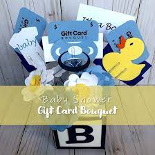Your fold should be about 3/4 inch wide and roll from both ends, so you have nice smooth edges when you stack two of the cloths as shown below. Boy Baby Shower Gift Card Bouquet Baby Boy Gift Or Baby Girl Gift With Paper Flowers And Giftcard Holders Gift Card Bouquet Baby Shower Gift Card Baby Boy Gifts