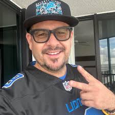 Caleb showed up to today's game in Ben Johnson's high school jersey.