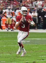 Josh Rosen Of The Arizona Cardinals Looks To Throw The Ball Against Arizona Cardinals Cardinals Football Helmets