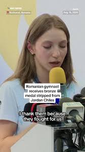 Romanian gymnast Ana Barbosu was presented with an Olympic bronze medal for  women's floor exercise following a series of rulings that led to Olympic  officials revoking a bronze medal in the event from ...