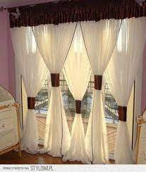 We're used to seeing curtains hanging in the usual fashion, quietly framing a window. Creative Ways To Hang Curtains Diy Bay Window Curtains Curtain Decor Diy Bay Window
