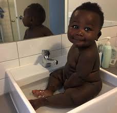 Take your time and gently place your baby into the water and allow them to get used to it. Psbattle This Smiling Kid In The Sink Taking A Bath Photoshopbattles