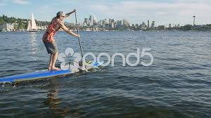 Seattle water sports is welcoming brandon thomas from the byerly crew, to evening of the stars! Seattle Wa Man On Lake Union Paddle Boarding With City Backgrou Stock Footage Ad Lake Union Man Seattle Lake Union Paddle Boarding Lake