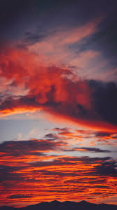 #sunset #picture #sunset picture #why does this make me sad #melancholy #tumblr #clouds #sky #purple sky #i just ran to my #sunset #pretty sunset #photo #sunset photography #sunset picture #sunset pics. Wallpaper Clouds Sky Sunset Red Porous Mountains Background Red Cloudy Sky 938x1668 Wallpaper Teahub Io