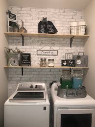 This faux farmhouse laundry room is the exact laundry room of our dreams! Laundry Room Farmhouse Style Laundry Room Diy Laundy Room Laundry Room Decor