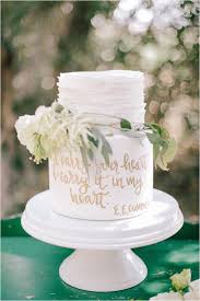 10 Calligraphy Wedding Cakes To Swoon Over Love Inc Mag Calligraphy Wedding Cake White Wedding Cakes Painted Wedding Cake