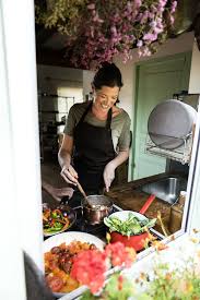 Download Premium Image Of Woman Cooking Lunch In The Kitchen Food Cooking Photography Cooking Kitchen Cooking Photos