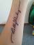 Cursive Lily Name Tattoo