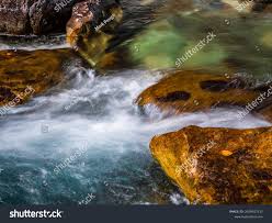 Lone Leaf Stranded On Rock Water Stock Photo 2059917137